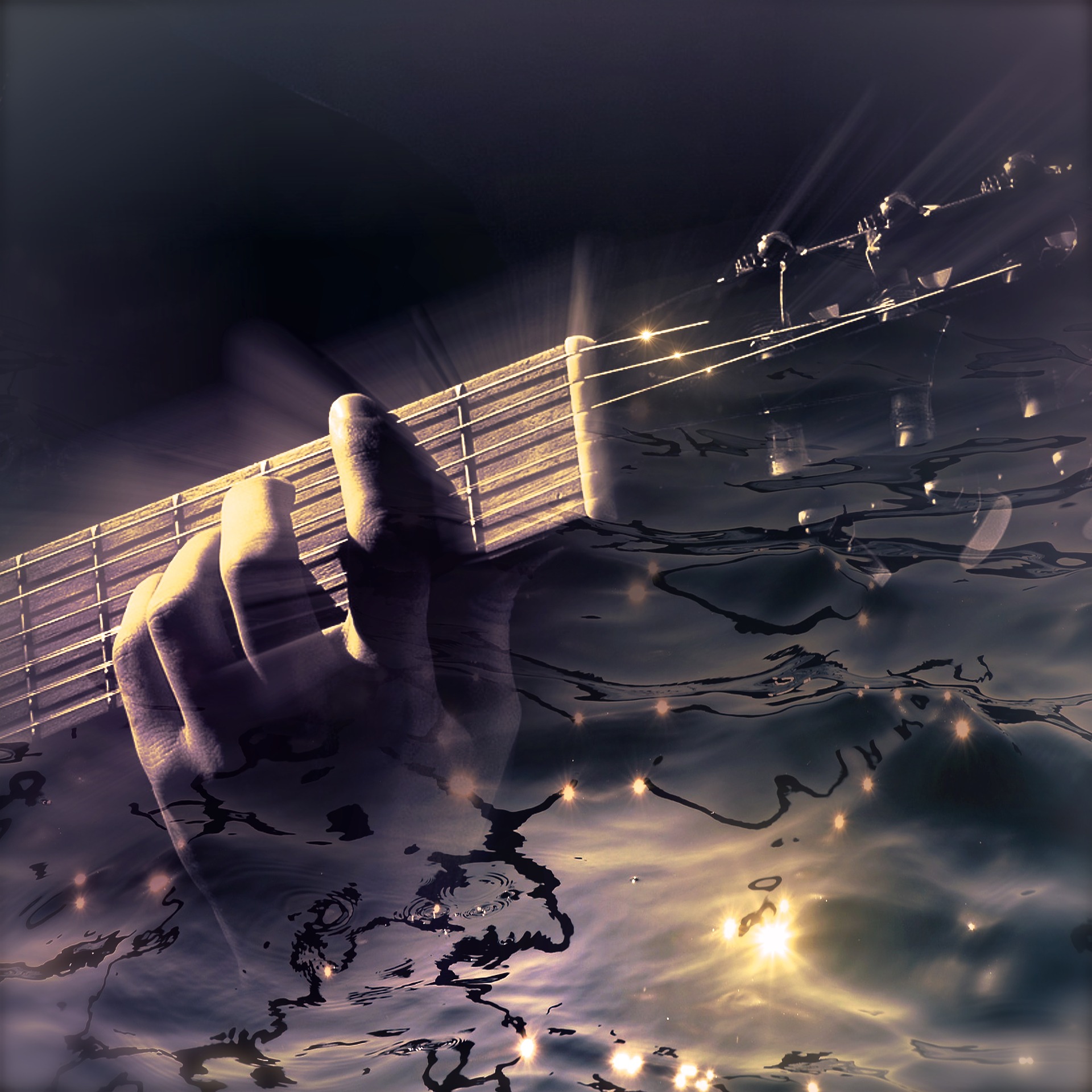 Hand die Gitarre spielt